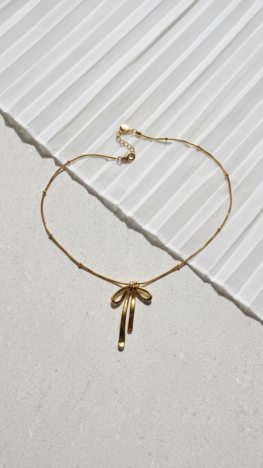 Golden Bow Pendant